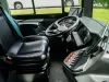 Intercity bus dashboard equipped with a video surveillance system monitor. steering wheel and dashboard panel of electric bus